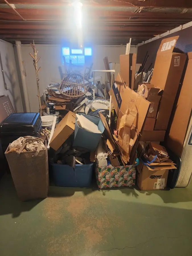 Roll-off dumpster container at job site for 8 Yard Dumpster Rental in Bluefield